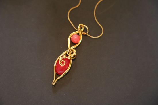 Immagine di gold flame , collana dorata in corniola 